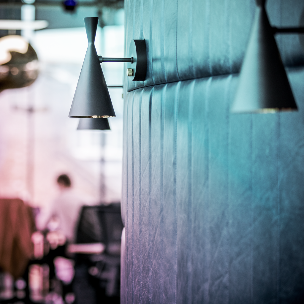 close up image of downward facing light fixtures on a wall